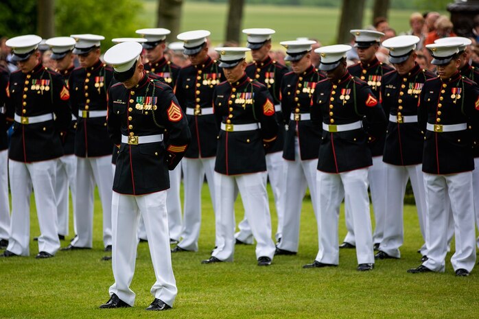 U.S. Marines from the 1st Marine Division and their French counterparts gather at Aisne-Marne American Cemetery to commemorate their fallen heroes in Belleau, France on May 31, 2015. This Memorial Day ceremony was held in honor of the 97th anniversary of the Battle of Belleau Wood. (U.S. Marine Corps photo by Lance Cpl. Akeel Austin/Released)