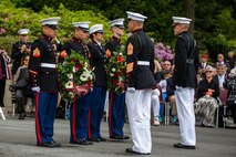 U.S. Marines from the 1st Marine Division and their French counterparts gather at Aisne-Marne American Cemetery to commemorate their fallen heroes in Belleau, France, on May 31, 2015. This Memorial Day ceremony was held in honor of the 97th anniversary of the Battle of Belleau Wood. (U.S. Marine Corps photo by Lance Cpl. Akeel Austin/Released)
