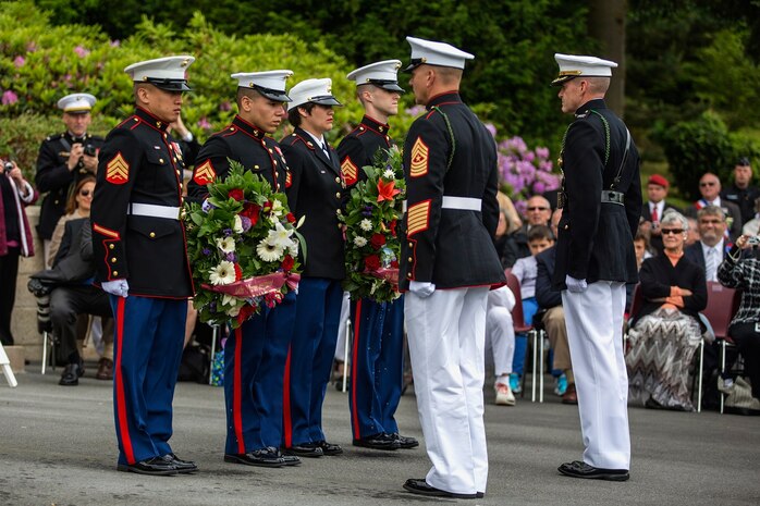 U.S. Marines from the 1st Marine Division and their French counterparts gather at Aisne-Marne American Cemetery to commemorate their fallen heroes in Belleau, France, on May 31, 2015. This Memorial Day ceremony was held in honor of the 97th anniversary of the Battle of Belleau Wood. (U.S. Marine Corps photo by Lance Cpl. Akeel Austin/Released)