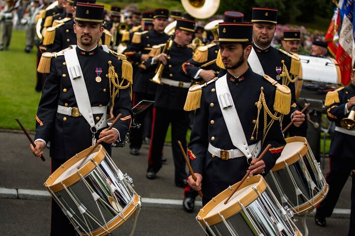 U.S. Marines from the 1st Marine Division and their French counterparts gather at Aisne-Marne American Cemetery to commemorate their fallen heroes in Belleau, France, on May 31, 2015. This Memorial Day ceremony was held in honor of the 97th anniversary of the Battle of Belleau Wood. (U.S. Marine Corps photo by Lance Cpl. Akeel Austin/Released)