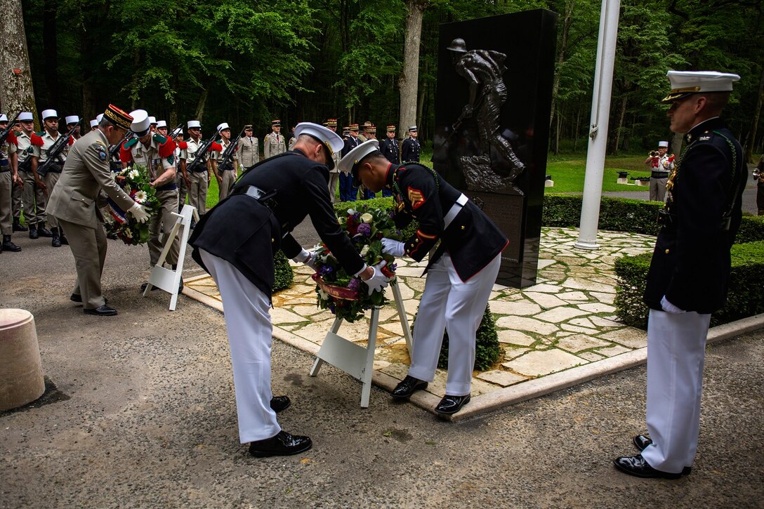 U.S. Marines from the 1st Marine Division and their French counterparts gather at Aisne-Marne American Cemetery to commemorate their fallen heroes in Belleau, France, on May 31, 2015. This Memorial Day ceremony was held in honor of the 97th anniversary of the Battle of Belleau Wood. (U.S. Marine Corps photo by Lance Cpl. Akeel Austin/Released)