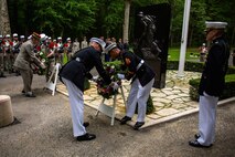 U.S. Marines from the 1st Marine Division and their French counterparts gather at Aisne-Marne American Cemetery to commemorate their fallen heroes in Belleau, France, on May 31, 2015. This Memorial Day ceremony was held in honor of the 97th anniversary of the Battle of Belleau Wood. (U.S. Marine Corps photo by Lance Cpl. Akeel Austin/Released)