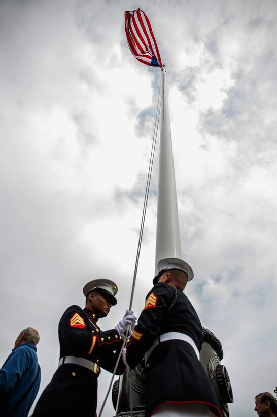 U.S. Marines from the 1st Marine Division and their French counterparts gather at Aisne-Marne American Cemetery to commemorate their fallen heroes in Belleau, France, on May 31, 2015. This Memorial Day ceremony was held in honor of the 97th anniversary of the Battle of Belleau Wood. (U.S. Marine Corps photo by Lance Cpl. Akeel Austin/Released)