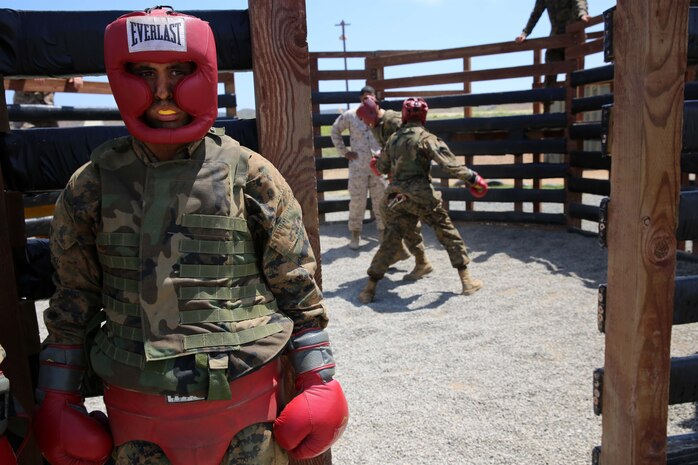 Recruit David E. Rogers, Fox Company, 2nd Recruit Training Battalion, waits for his turn at body sparring during the Crucible at Marine Corps Base Camp Pendleton, June 2. Rogers is Humboldt County, Calif., native and was recruited out of Recruiting Station San Francisco. Today, all males recruited from west of the Mississippi are trained at MCRD San Diego. The depot is responsible for training more than 16,000 recruits annually. Company F is scheduled to graduate from recruit training on June 12.