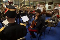 U.S. Marines with the 1st Marine Division Band observe as a quartet of French Army Orchestra members play at the school of music on Camp d' Satory, Versailles, France, May 26, 2015. The 1st Marine Division Band took a tour of the French Army Music School after a rehearsal that had taken place earlier that day. (U.S. Marine Corps photo by Sgt. Luis A. Vega/Released)