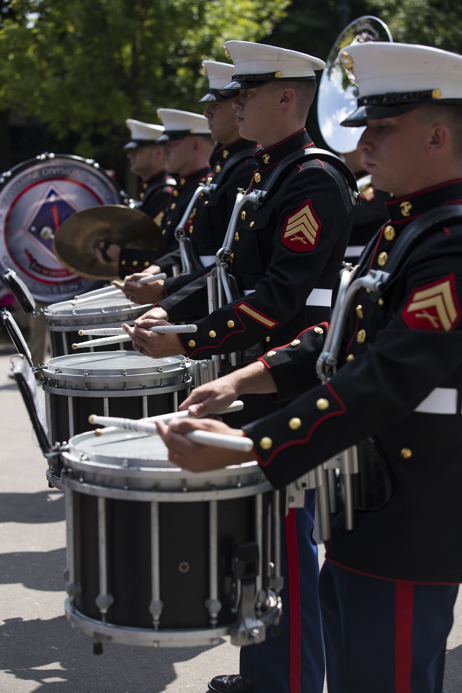 U.S. Marines with the 1st Marine Division Band perform at Le Jardin d'Acclimatation in Paris, France, on May, 27, 2015. The band's performance is one of many events that will be going on during their visit to France as part of the Belleau Wood anniversary ceremony. (U.S. Marine Corps photo by Sgt. Luis A. Vega/Released)
