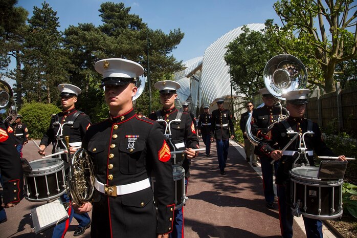 U.S. Marines with the 1st Marine Division Band perform at Le Jardin d'Acclimatation in Paris, France, on May, 27, 2015. The band's performance is one of many events that will be going on during their visit to France as part of the Belleau Wood anniversary ceremony. (U.S. Marine Corps photo by Sgt. Luis A. Vega/Released)