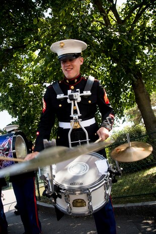 U.S. Marines Corps Sgt. Geoffrey Parks, a percussionist with the 1st Marine Division Band, performs at Le Jardin d'Acclimatation in Paris, France, on May, 27, 2015. The 1st Marine Division band is visiting France as part of the Belleau Wood anniversary ceremony. (U.S. Marine Corps photo by Sgt. Luis A. Vega/Released)