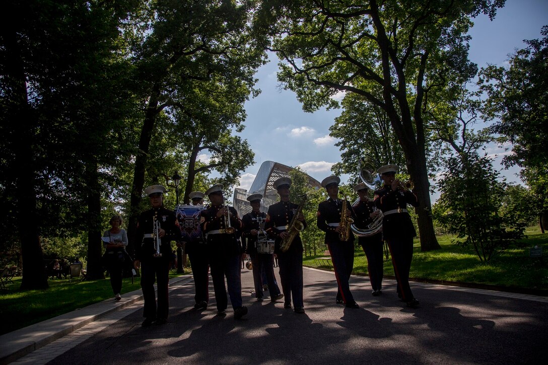 U.S. Marines with the 1st Marine Division Band perform at Le Jardin d'Acclimatation in Paris, France, on May, 27, 2015. The band's performance is one of many events that will be going on during their visit to France as part of the Belleau Wood anniversary ceremony. (U.S. Marine Corps photo by Sgt. Luis A. Vega/Released)