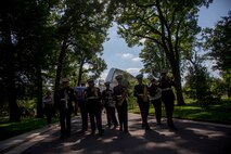 U.S. Marines with the 1st Marine Division Band perform at Le Jardin d'Acclimatation in Paris, France, on May, 27, 2015. The band's performance is one of many events that will be going on during their visit to France as part of the Belleau Wood anniversary ceremony. (U.S. Marine Corps photo by Sgt. Luis A. Vega/Released)