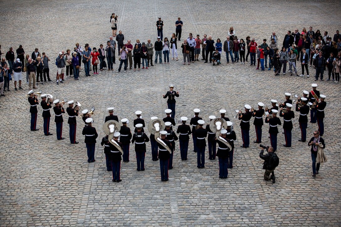 U.S. Marines with the 1st Marine Division Band perform at Les Invalides in Paris, France, on May, 28, 2015. The band's performance is one of many events that will be taking place during their visit to France as part of the Belleau Wood anniversary ceremony. (U.S. Marine Corps photo by Sgt. Luis A. Vega/Released)
