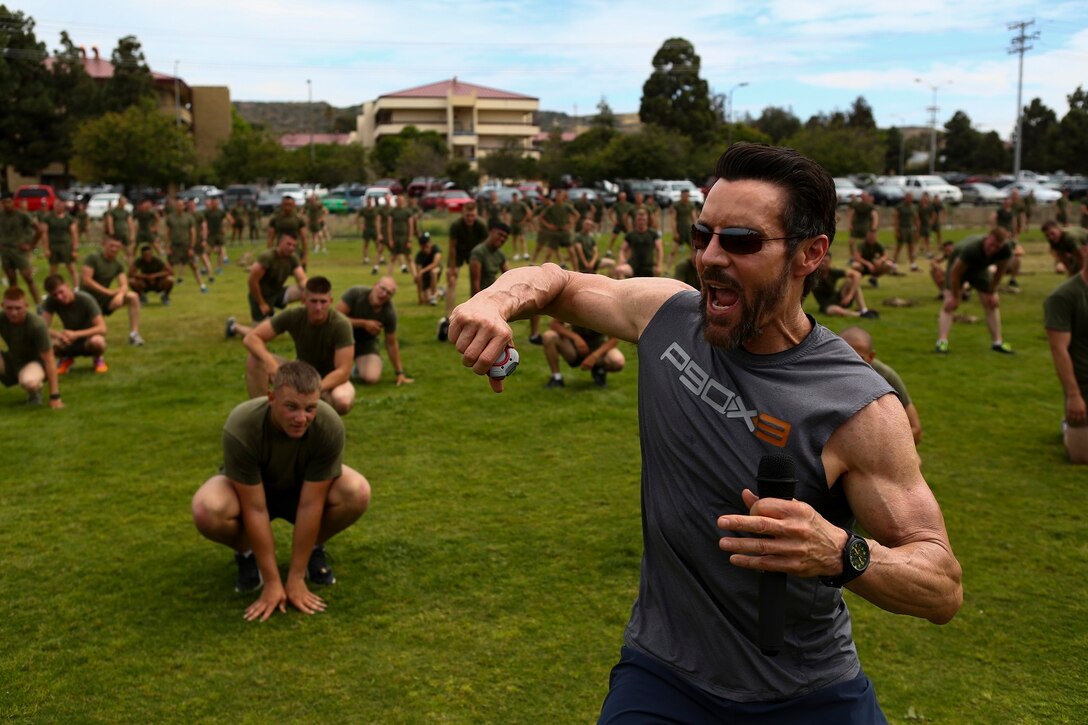Tony Horton, the creator of P90X, instructs morning physical fitness for the Marines assigned to 3rd Battalion, 5th Marine Regiment, aboard Camp Pendleton, Calif., June 9, 2015. Horton believes Marines need to focus on nutrition and a wide variety of exercises to be ready for any mission as may be directed.