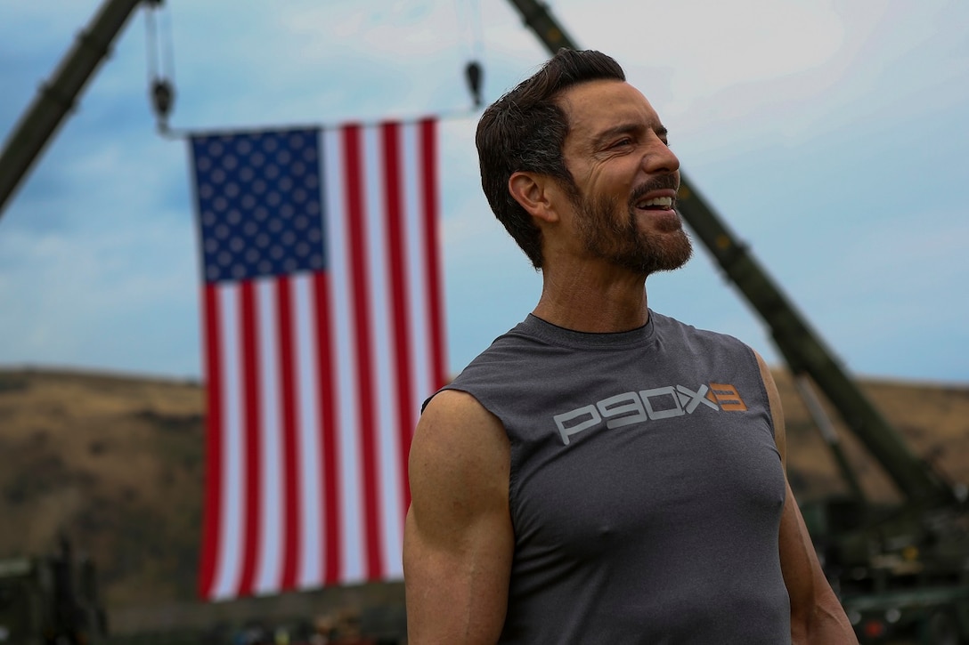 Tony Horton, the creator the fitness program P90X, speaks to Marines assigned to 3rd Battalion, 5th Marine Regiment, aboard Camp Pendleton, Calif., June 9, 2015. Horton believes Marines need to focus on nutrition and a wide variety of exercises to be ready for any mission as may be directed. (U.S. Marine photo by Cpl. Will Perkins/RELEASED)