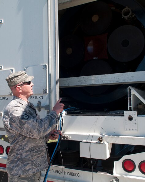 Staff Sgt. Kevin Cain, 90th Missile Maintenance Squadron weapons safety representative, escorts the weapon safety inspectors during 90th MMXS’s annual weapons safety inspection June 9, 2015, on F.E. Warren Air Force Base, Wyo. Cain also participated in the squadrons annual ground safety inspection at the same time. (U.S. Air Force photo by Airman 1st Class Malcolm Mayfield)