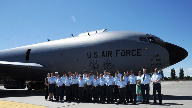 Royal Canadian Air Cadets from squadrons in British Columbia, Canada, pose for a photo outside of a KC-135 Stratotanker at Fairchild Air Force Base, Wash., June 5, 2015. Airmen from the 92nd and 93rd Air Refueling Squadrons showed the cadets around the aircraft.  (U.S. Air Force photo/Senior Airman Sam Fogleman)