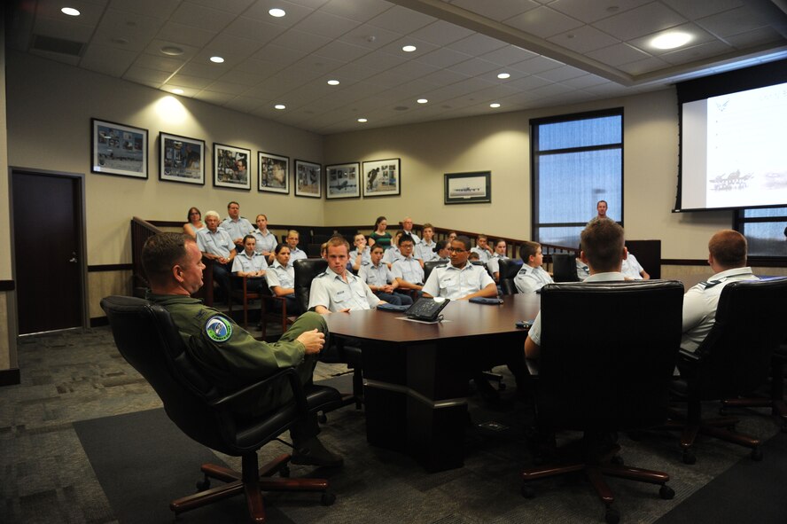Col. Brian McDaniel, 92nd Air Refueling Wing commander, briefs Royal Canadian Air Cadets touring selected facilities at Fairchild Air Force Base, Wash., June 5, 2015. The cadets were from squadrons in British Columbia, Canada. (U.S. Air Force photo/Senior Airman Sam Fogleman)