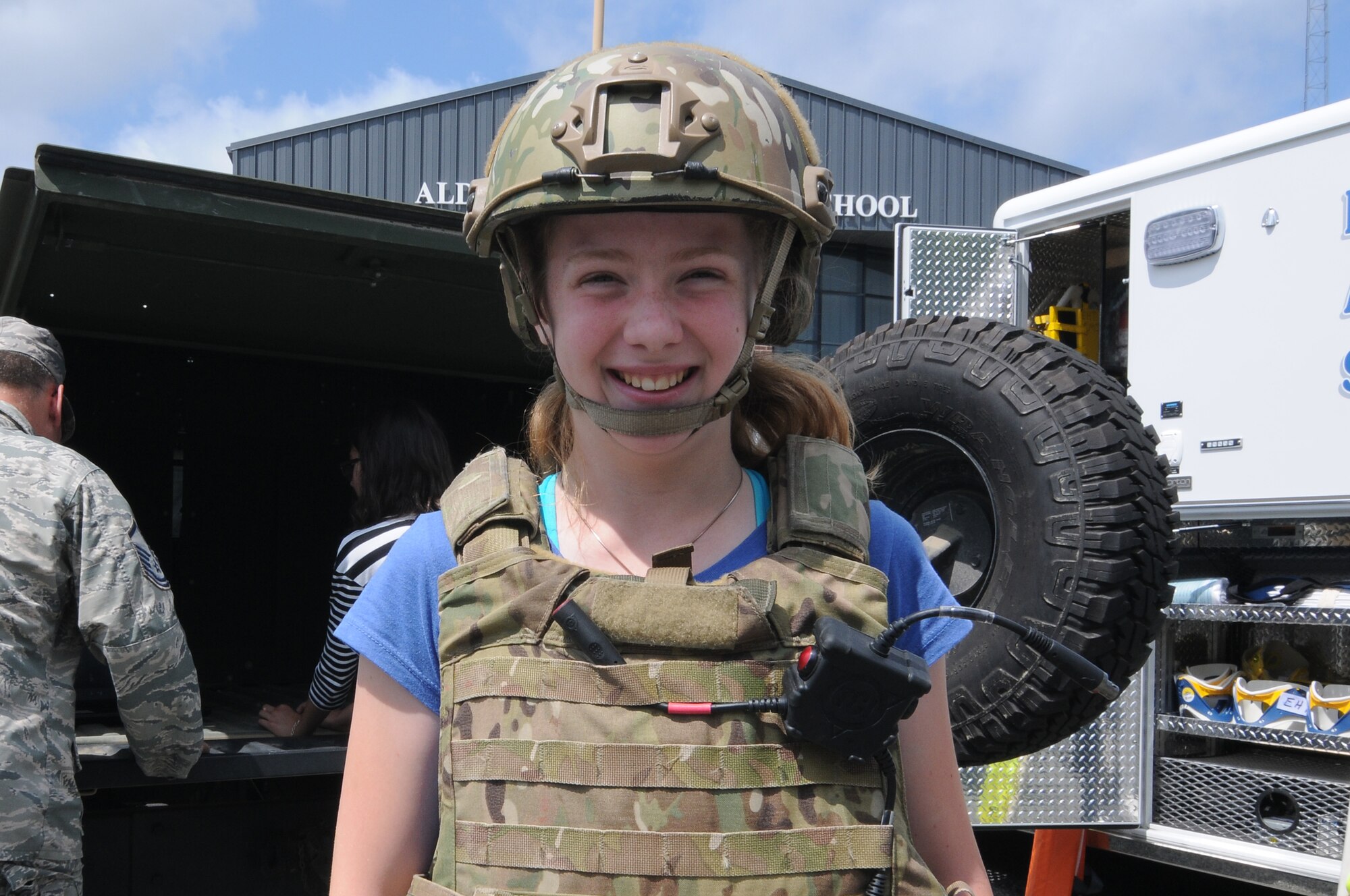 A picture of a student wearing a tactical vest and ballistic helmet.