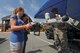 U.S. Air Force Tech. Sgt. Philip Douglass, 177th Civil Engineer Squadron explosive ordnance disposal technician, explains the basic operation of an Air Force Medium-Sized Robot to students from Alder Avenue Middle School in Egg Harbor Township, New Jersey on June 9, 2015. Members of the New Jersey Air National Guard and local first responders brought out equipment and set up displays to teach students about the services they provide to the community. (U.S. Air National Guard photo by Airman 1st Class Amber Powell/Released)