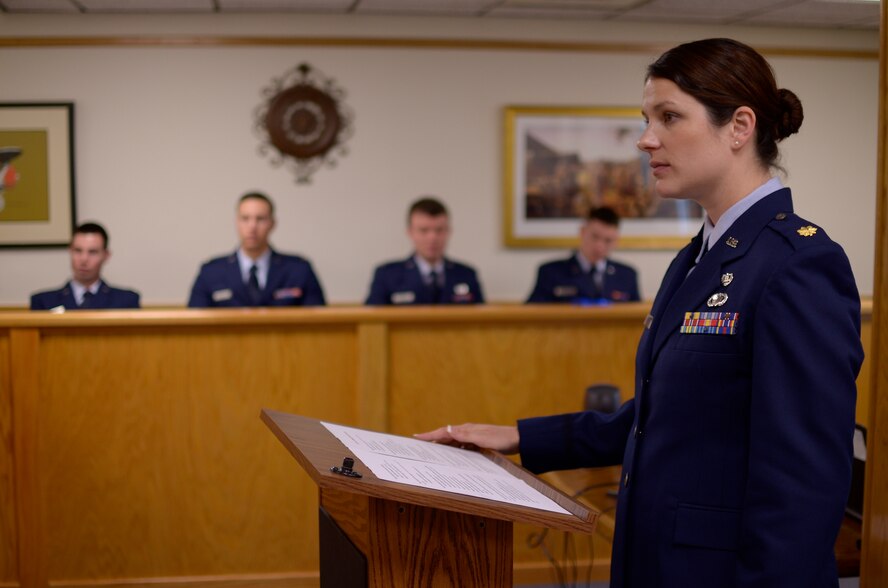 Maj. Megan Schmid, a lawyer from the 71st Flying Training Wing Legal Office, interviews an Air Force Office of Special Investigation agent during a mock sexual assault trial April 21 in the Federal Courtroom at Vance Air Force Base, Oklahoma. Vance hosted its 13th mock sexual assault trial June 4 to educate Airmen here about the court martial process and the complexity of sexual assault cases. (U.S. Air Force photo / 2nd Lt. Mikhail Berlin)