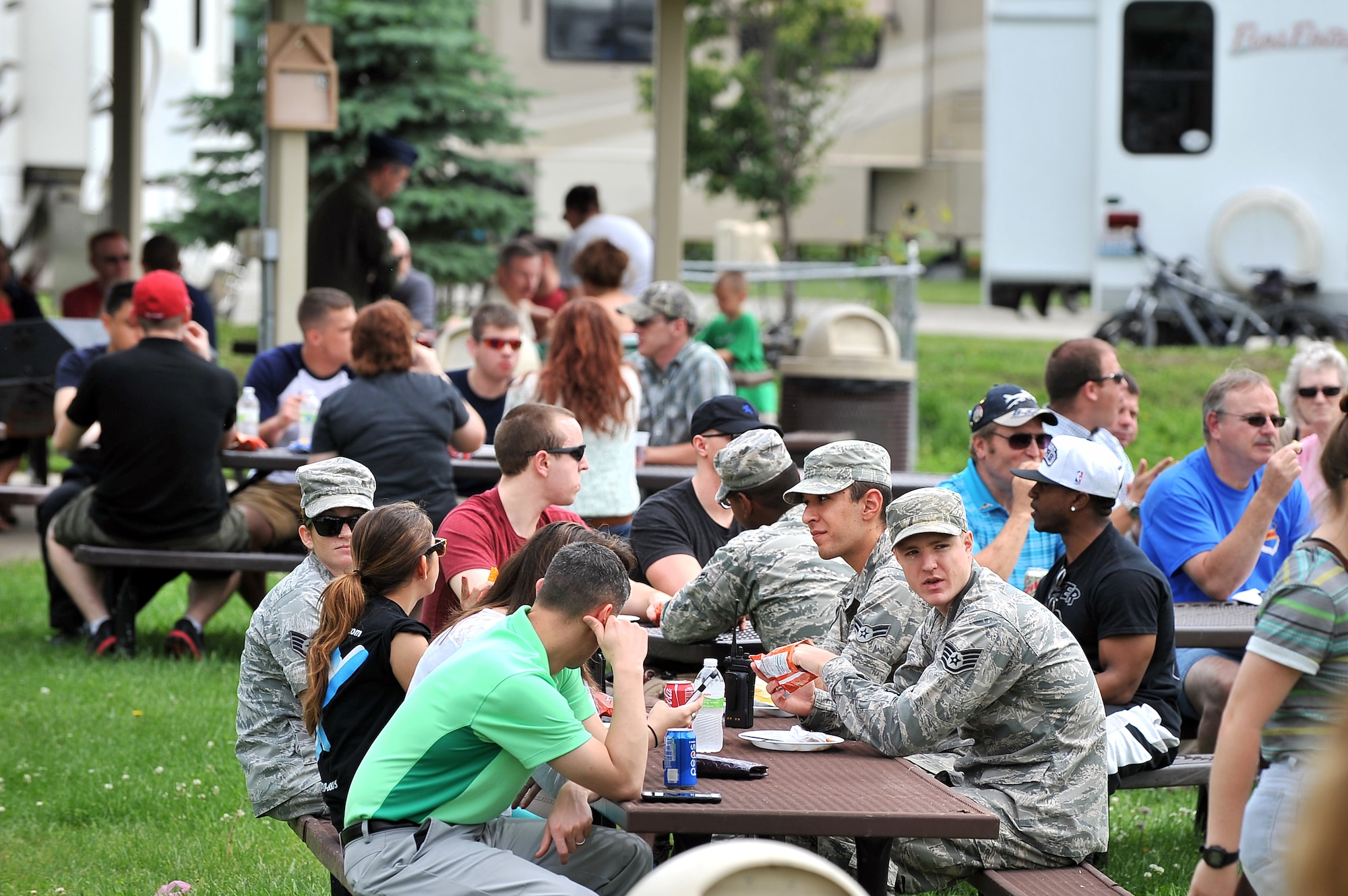 Airman, civilians and contractors, and their families enjoy the annual Offutt Appreciation Day Picnic June 5 at the Offutt Base Lake.  The Offutt Advisory Council, comprised of local area leaders and businesses, donated their time and resources in order to give back to the members of the Offutt community.  (U.S. Air Force photo by Josh Plueger/Released)