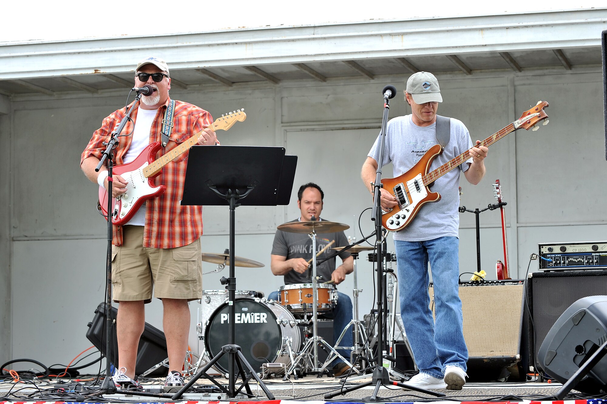 Local cover band, Out of the Fire, performs for hundreds of Team Offutt members June 5 during the Offutt Appreciation Day Picnic at the Offutt Base Lake.  Every year the local community gives back to the men and women of Offutt Air Force Base, Nebraska, with a free picnic packed with food, prizes and entertainment.  (U.S. Air Force photo by Josh Plueger/Released)