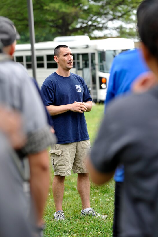 U.S. Air Force Lt. Col. Anthony Figiera, 633rd Civil Engineer Squadron commander, speaks during the 27th annual “Clean the Bay Day” at Langley Air Force Base, Va., June, 6, 2015. Airmen from Langley Air Force Base have participated in the event for more than 10 years. (U.S. Air Force photo by Senior Airman Breonna Veal/ Released)