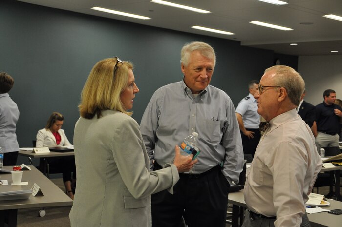Local community leaders discuss upcoming initiatives during the P4 Community Partnering Final Planning Meeting June 5, 2015 at the Charleston Chamber of Commerce in North Charleston, S.C. Together leadership and the community have been working over the last several months in groups to look at and develop creative ways to leverage capabilities and resources, combine like services, and improve the quality of life for those who call Charleston home. The Final Planning Meeting, also called the “Realities Workshop,” was the third workshop held and provided a forum for the group to review ten potential initiatives and areas for partnership. (U.S. Air Force photo / Michaela Judge)

