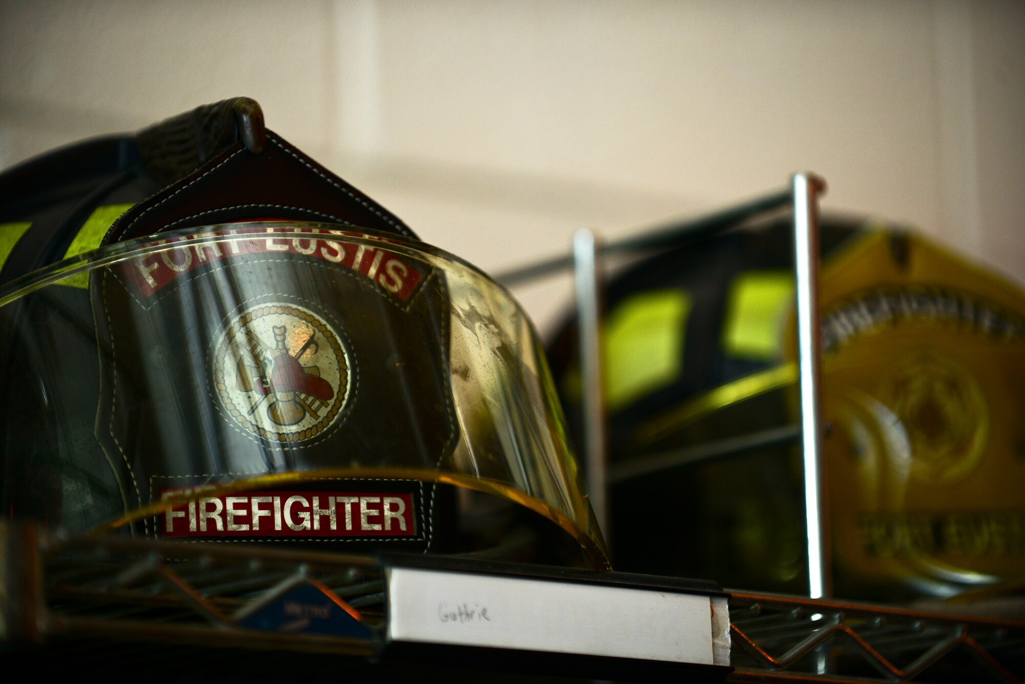 A Fort Eustis firefighter helmet sits inside a locker at the 733rd Civil Engineer Division Fire Department at Fort Eustis, Va., June 8, 2015. The helmet is part of the protective gear firefighters must don when responding to emergencies.  (U.S. Air Force photo by Senior Airman Kimberly Nagle/Released)  