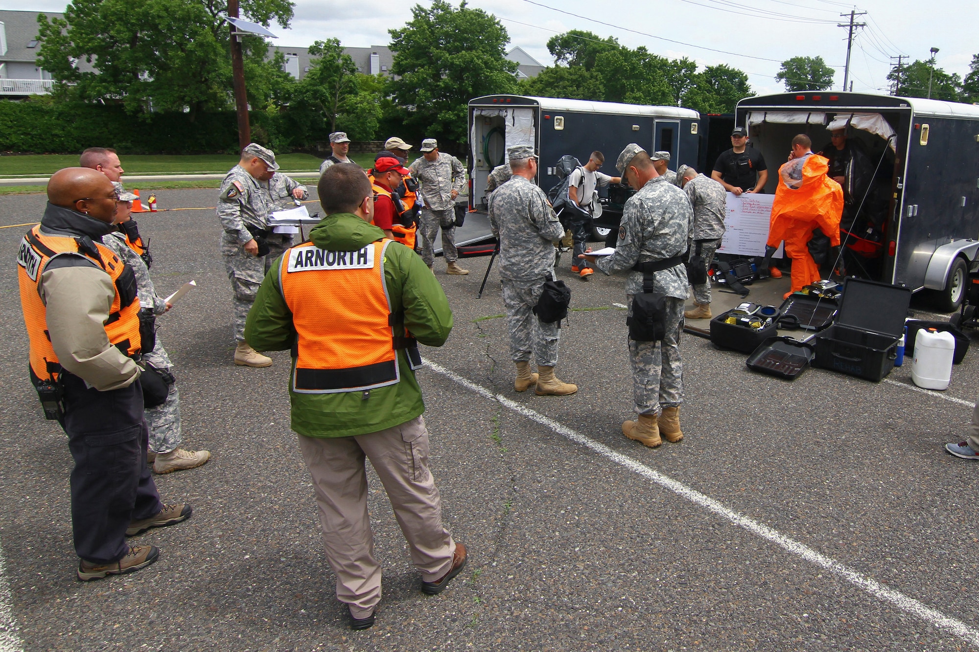 U.S. Army Staff Sgt. Jeff Whalen from the New Jersey National Guard's 21st Civil Support Team pulls a wagon filled with detection gear during a weapons of mass destruction response exercise at the Cherry Hill Armory in Cherry Hill, N.J., June 3, 2015. The 21st Civil Support Team is made up of both Army and Air National Guard members, and is located on Joint Base McGuire-Dix-Lakehurst, N.J. (U.S. Air National Guard photo by Tech. Sgt. Matt Hecht/Released)