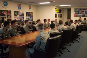 Capt. Timothy Sparks and Lt. Col. Christopher May give a group of cadets from the United States Air Force Academy in Colorado Springs, Col., and Reserve Officer Training Corps programs from across the United States  the Joint Base Charleston mission brief June 4, 2015 at JB Charleston, S.C.. The cadets are visiting JB Charleston for two weeks as part of Operation Air Force, which exposes them to a real-world Air Force environment and provides them the opportunity to see how base components work together to meet the mission. This is the first of three group scheduled to visit the base. (U.S. Air Force photo / Trisha Gallaway)  