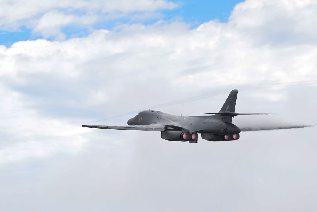 A B-1B Lancer assigned to Dyess Air Force Base, Texas, takes off May 8, 2015, from Andersen Air Force Base, Guam. The B-1s recently conducted test and training missions in the Asia-Pacific region to validate the modified jet's long-range strike capability and to further develop maritime tactics, techniques and procedures for the airframe. (U.S. Air Force photo by Senior Airman Katrina M. Brisbin/Released)