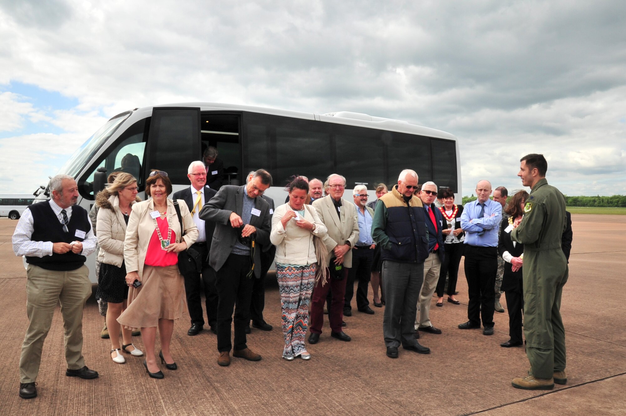 Lt. Col. Bradley Dyer, 23rd Expeditionary Bomb Squadron commander, briefs local civic leaders before a tour of the B-52H Stratofortress at Royal Air Force Fairford, England, June 9, 2015. While at RAF Fairford, the bombers will conduct training flights with ground and naval forces around the region and participate in multi-national exercises BALTOPS 15 and Saber Strike 15. (U.S. Air Force photo/Senior Airman Malia Jenkins)    