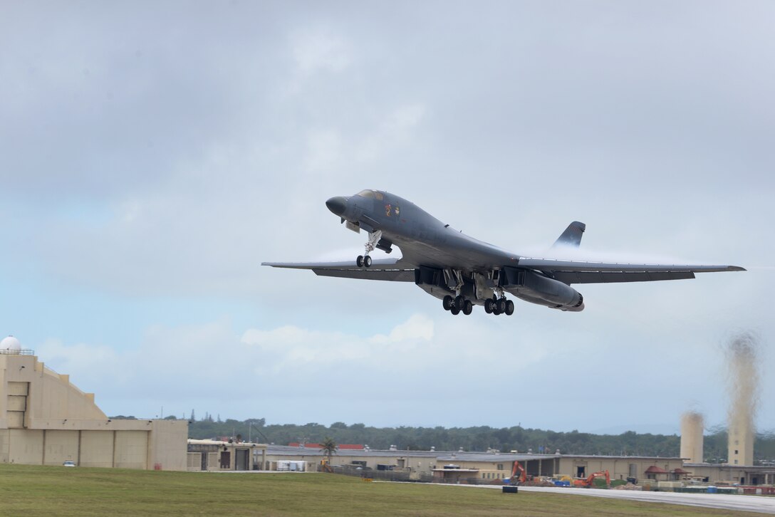 A B-1B Lancer assigned to Dyess Air Force Base, Texas, takes off May 8, 2015, from Andersen Air Force Base, Guam. The B-1s recently conducted test and training missions in the Asia-Pacific region to validate the modified jet's long-range strike capability and to further develop maritime tactics, techniques and procedures for the airframe. (U.S. Air Force photo by Senior Airman Katrina M. Brisbin/Released)