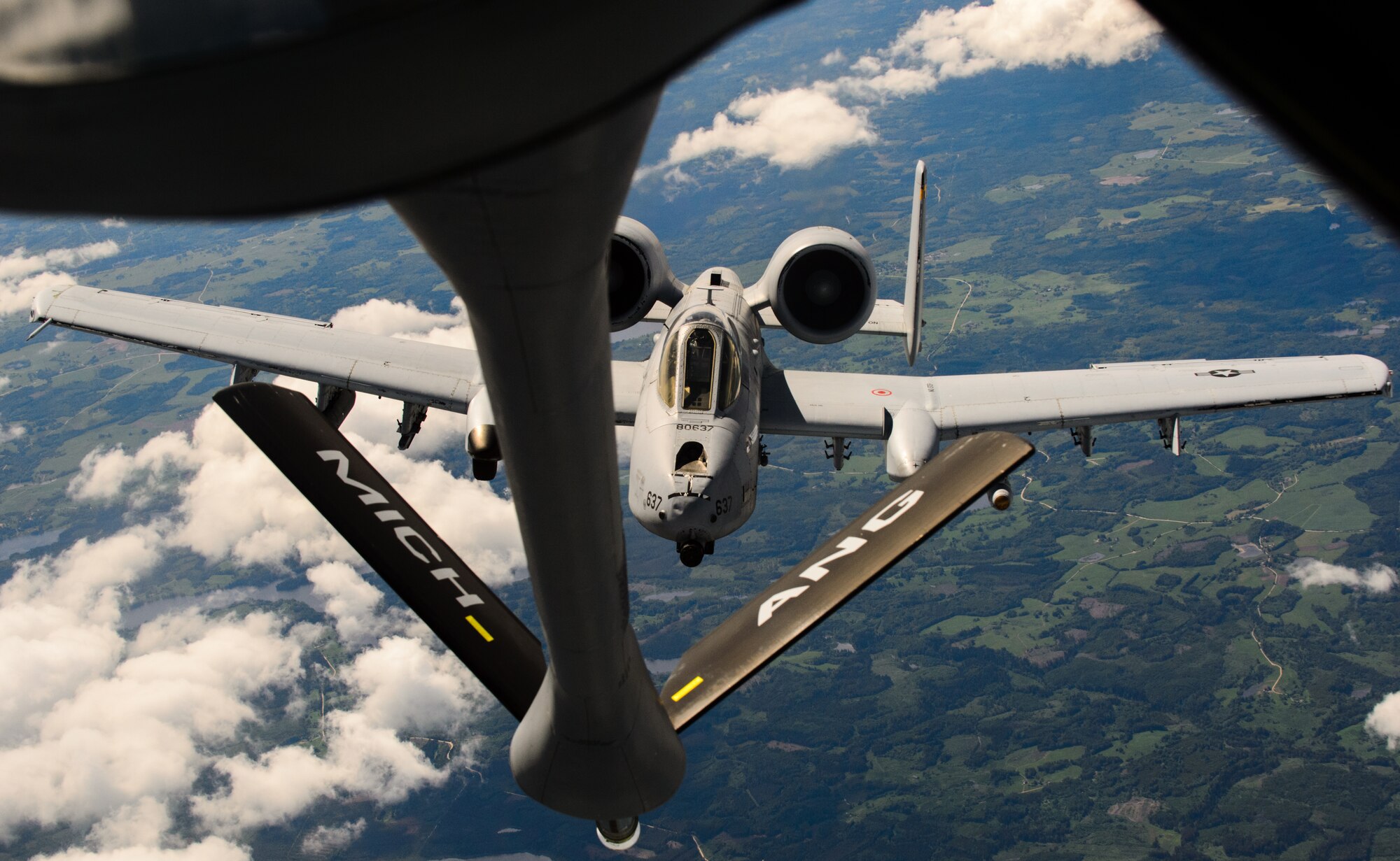 An Air National Guard KC-135 Stratotanker and A-10 Thunderbolt II prepare to refuel and continue with close air support for multiple nations participating in Saber Strike 15 June 9, 2015 in Latvian Air Space.Guardsmen from Maryland, Michigan and Pennsylvania came together to support Saber Strike 15 by providing aerial-refueling and close air support. Saber Strike 15 is a joint and multinational exercise designed to promote stability in the Baltic area and provide an opportunity for military members to sharpen their skills. (U.S. Air Force photo/ Staff Sgt. Armando A. Schwier-Morales)