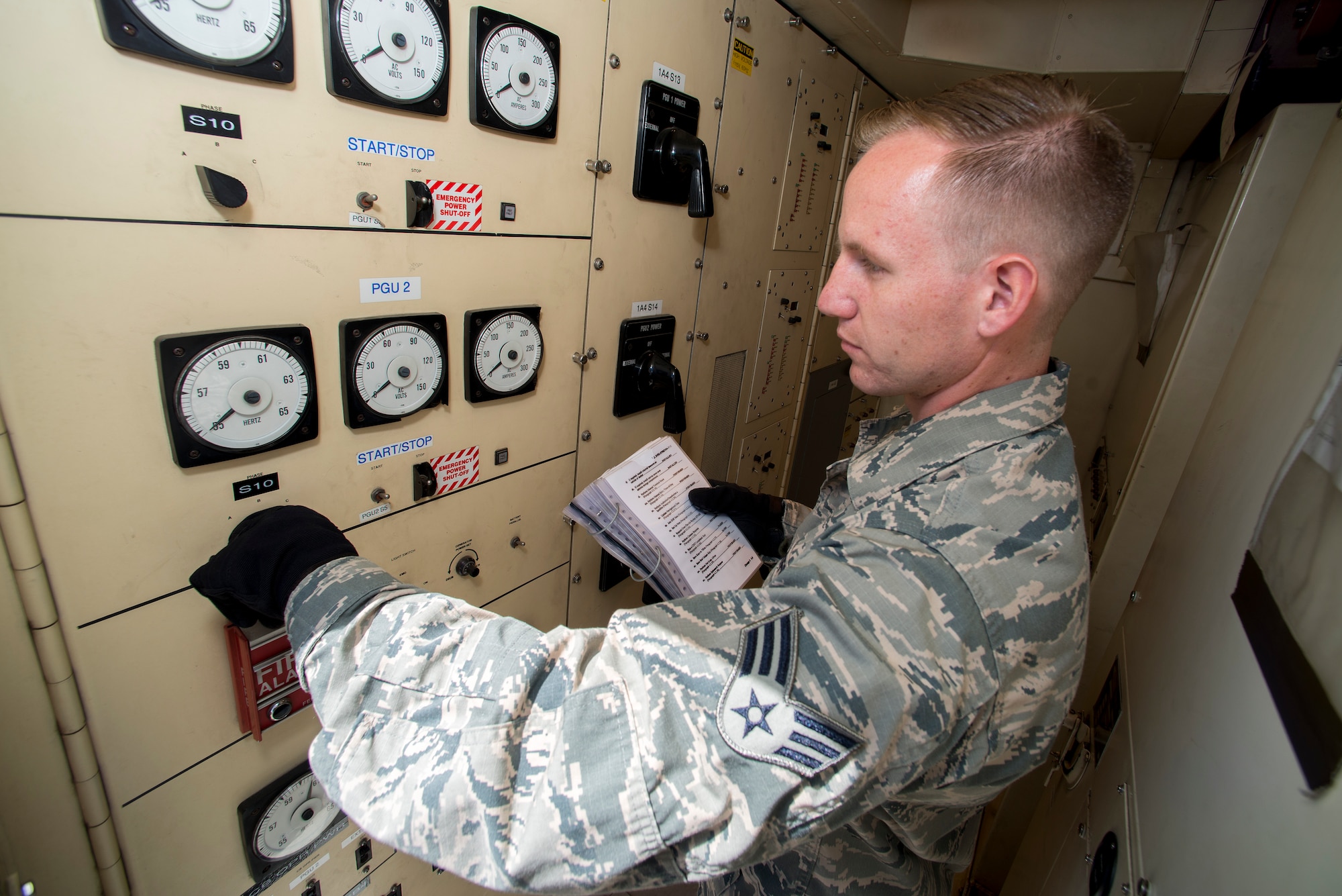 U.S. Air Force Senior Airman Jonathan R. Smail, a transmission technician from the 233rd Space Communications Squadron, Colorado Air National Guard, monitors computer systems in a mobile satellite trailer at Greeley Air National Guard Station, Greeley, Colo., June 7, 2015. Smail, who troubleshoots and maintains satellite communications electronic equipment for the 233rd's one-of-a-kind mobile nuclear and missile launch tracking mission, won the 2014 Air National Guardsman of the year. (Air National Guard photo by Tech. Sgt. Wolfram M. Stumpf)