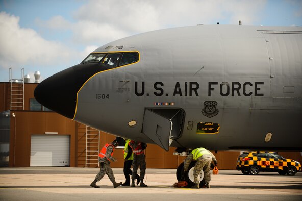 Airmen from the Pennsylvania & Michigan Air National Guard secure a KC-135 Stratotanker after completion of its sortie in support of a multilateral exercise June 9, 2015 at Riga International Airport, Latvia. Guardsmen from Maryland, Michigan and Pennsylvania came together to support Saber Strike 15 by providing aerial-refueling and close air support. Saber Strike 15 is a joint and multinational exercise designed to promote stability in the Baltic area and provide an opportunity for military members to sharpen their skills. (U.S. Air Force photo/ Staff Sgt. Armando A. Schwier-Morales)