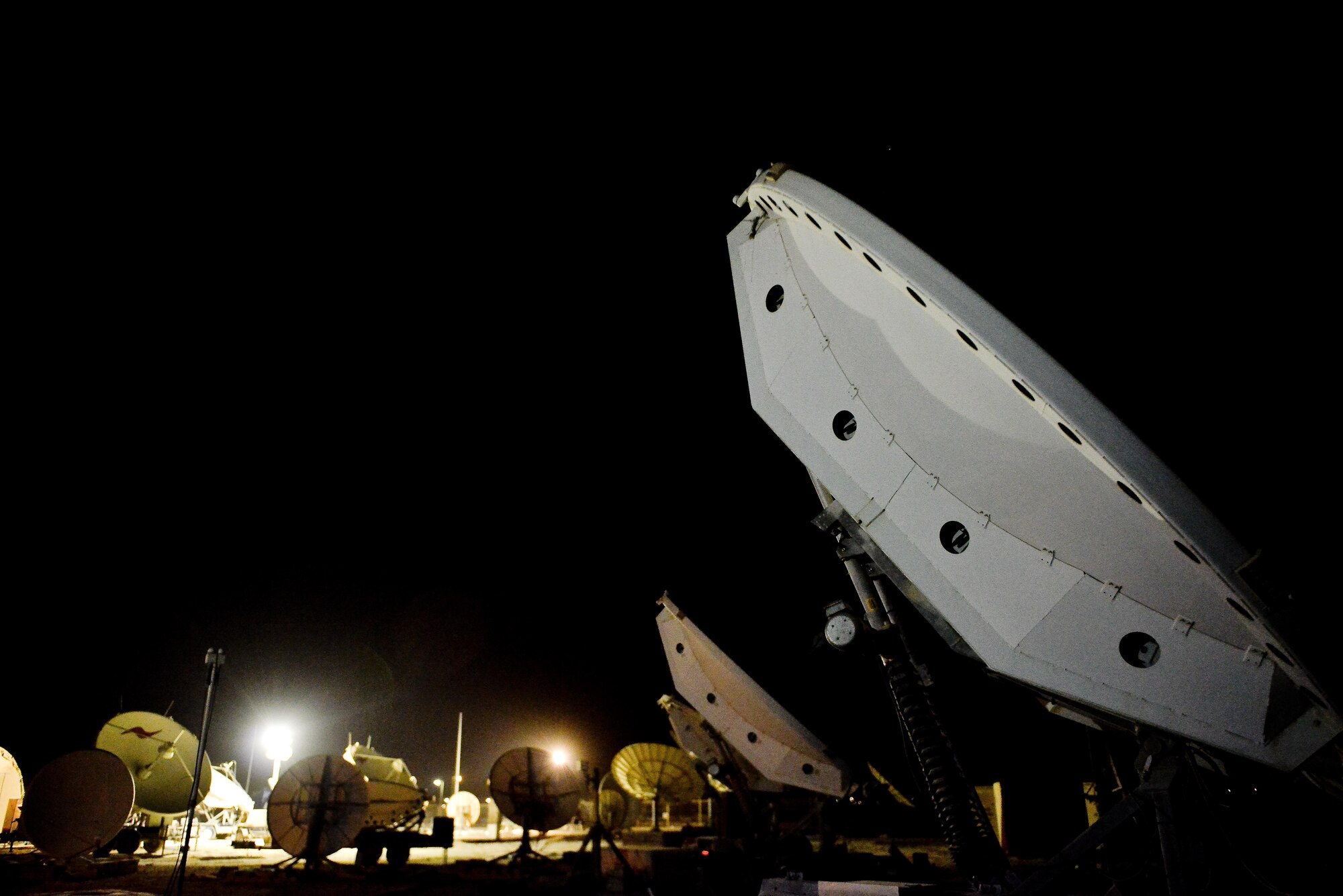 The 379th Expeditionary Operations Support Squadron operates through an antenna ‘farm’ of two weapons systems named Rapid Attack Identification Detection Reporting System Deployable Ground Segment and Bounty Hunter, which provide the only Defense Space Control mission throughout the entire area of responsibility. (U.S. Air Force photo/Staff Sgt. Alexandre Montes)