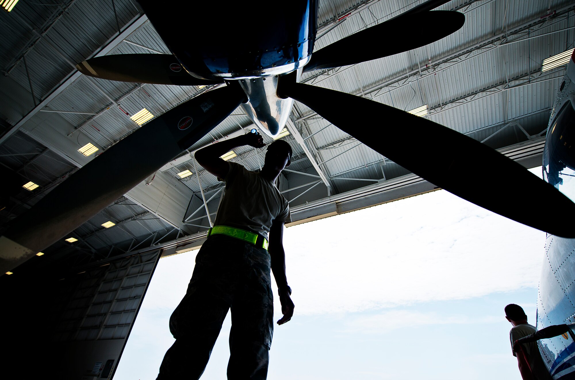 Airman Mario Hill, 919th Special Operations Maintenance Group, checks the intake of an engine on a C-145 June 6 at Duke Field, Fla. The 919th SOMXG is comprised of 919th SOMXS, 919th SOAMXS, 919th SOMOF, and the 592nd SOAMXS.  Their primary mission is the maintenance of the C-145 aircraft. (U.S. Air Force photo/Tech. Sgt. Sam King)