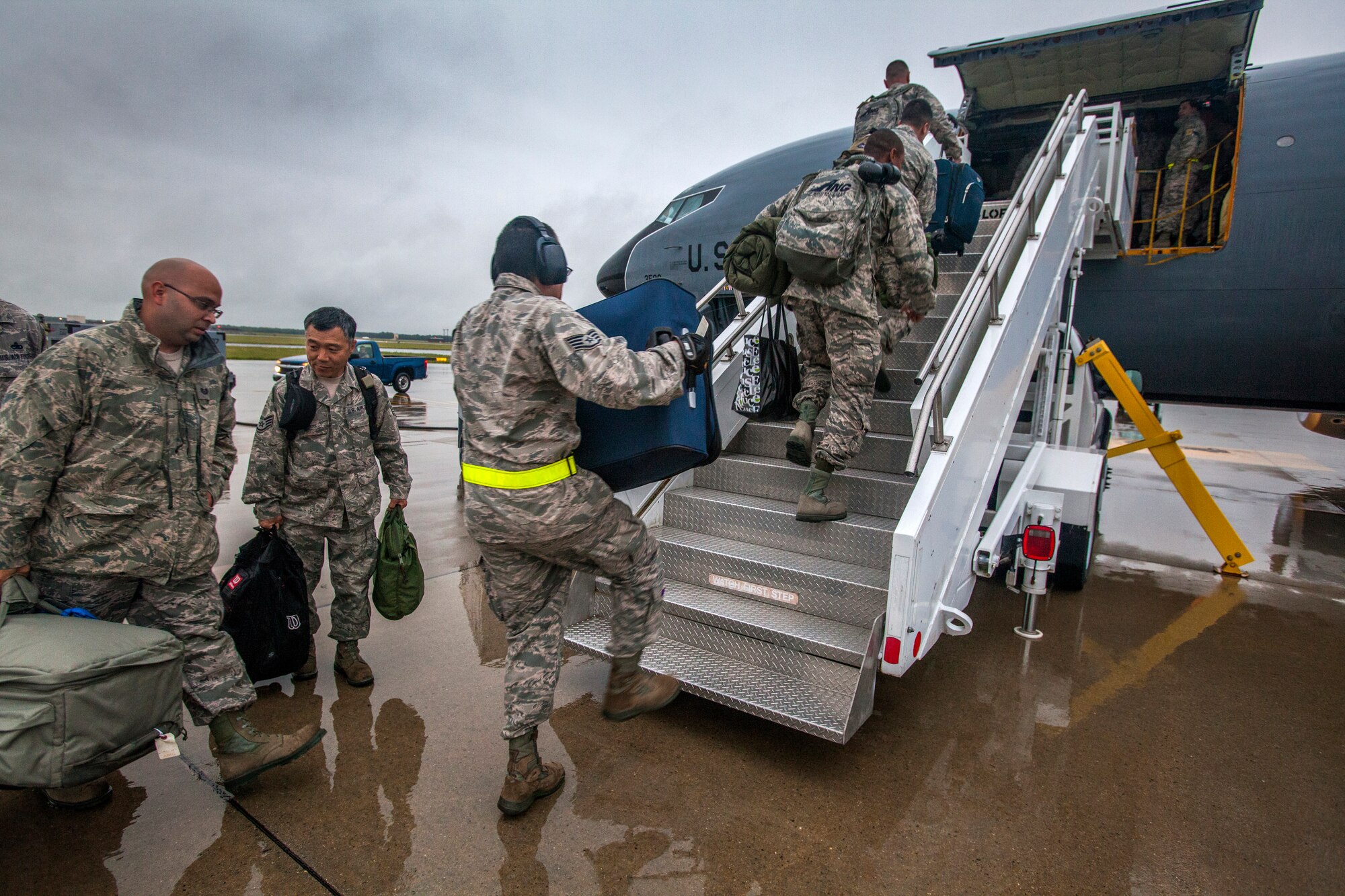 Airmen from the 108th Wing board a KC-135 Stratotanker on Joint Base McGuire-Dix-Lakehurst, N.J., June 2, 2015. Approximately 50 Airmen from the 108th Wing deployed to the Central Command area of responsibility in support of Operations Enduring Freedom and Freedom's Sentinel. (U.S. Air National Guard photo by Master Sgt. Mark C. Olsen/Released)
