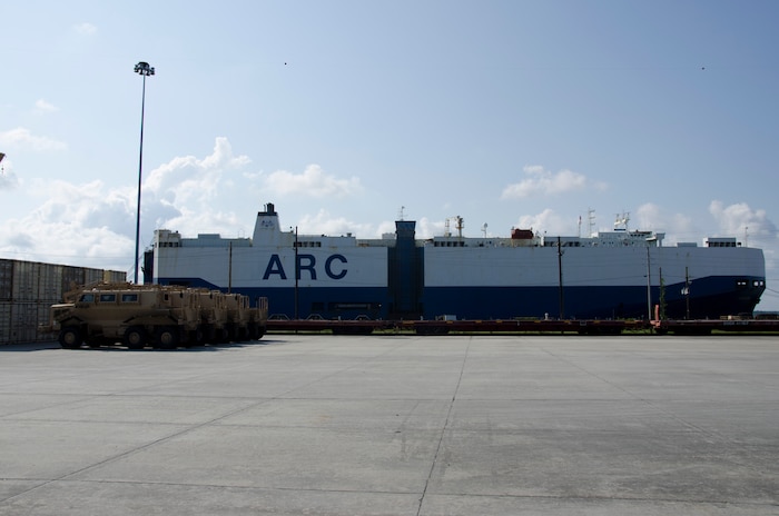 Equipment is loaded onto the ARC Freedom vehicle carrier, June 7, 2015 at Joint Base Charleston – Weapons Station, S.C. The 841st Transportation Battalion is loading more than 1,200 vehicles and equipment to be shipped to Europe. The 841st TB's mission is to conduct surface deployment and redeployment distribution and water terminal operations in support of the warfighter. (U.S. Air Force photo/Staff Sgt. AJ Hyatt)