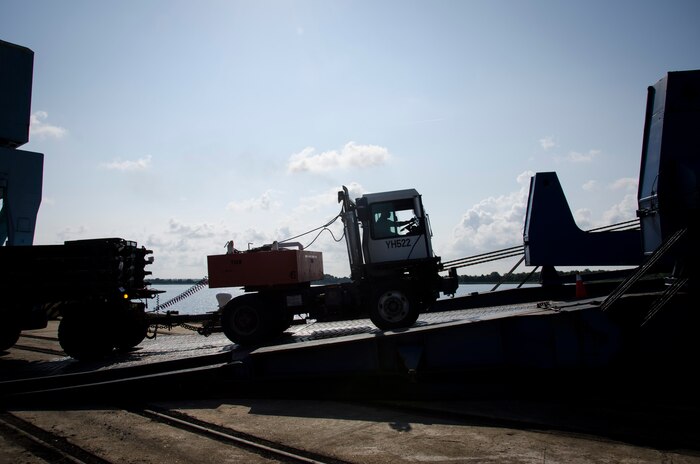 Equipment is loaded onto the ARC Freedom vehicle carrier, June 7, 2015 at Joint Base Charleston – Weapons Station, S.C. The 841st Transportation Battalion is loading more than 1,200 vehicles and equipment to be shipped to Europe. The 841st TB's mission is to conduct surface deployment and redeployment distribution and water terminal operations in support of the warfighter. (U.S. Air Force photo/Staff Sgt. AJ Hyatt)