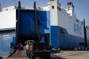Equipment is loaded onto the ARC Freedom vehicle carrier, June 7, 2015 at Joint Base Charleston – Weapons Station, S.C. The 841st Transportation Battalion is loading more than 1,200 vehicles and equipment to be shipped to Europe. The 841st TB's mission is to conduct surface deployment and redeployment distribution and water terminal operations in support of the warfighter. (U.S. Air Force photo/Staff Sgt. AJ Hyatt)