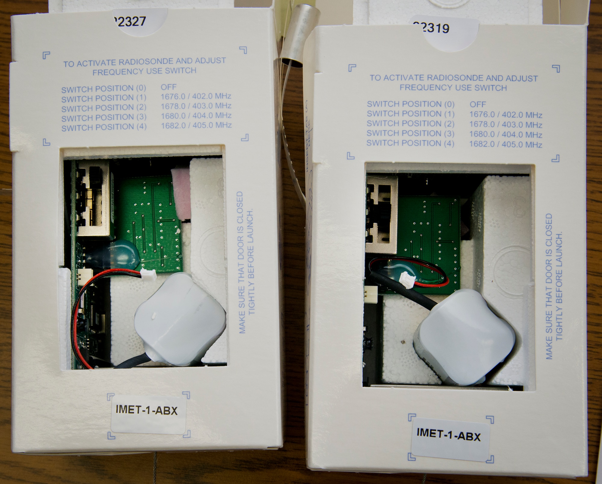 SONDE boxes are used to collect and transmit data from the weather balloon during its flight.  Some of the data collected are the GPS coordinates, wind speed, direction, height, ascension rate, pressure, temperature and humidity.  This information is collected by the 96th Weather Flight and provided to test engineers.  The engineers used the data in aircraft test evaluations.  (U.S. Air Force photo/Samuel King Jr.)