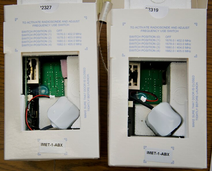 SONDE boxes are used to collect and transmit data from the weather balloon during its flight.  Some of the data collected are the GPS coordinates, wind speed, direction, height, ascension rate, pressure, temperature and humidity.  This information is collected by the 96th Weather Flight and provided to test engineers.  The engineers used the data in aircraft test evaluations.  (U.S. Air Force photo/Samuel King Jr.)