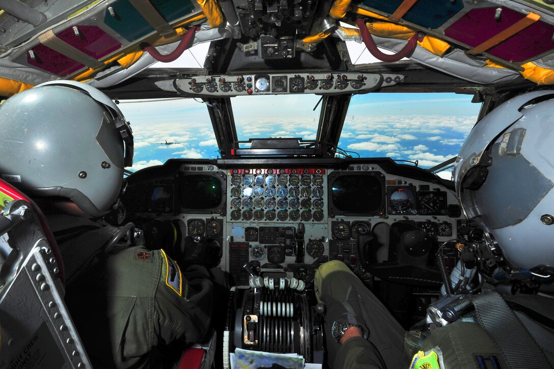 Two B-52H Stratofortress pilots maneuver behind the lead aircraft to complete a simulated air strike during exercise Saber Strike 15 in Europe, June 8, 2015. Bomber operations can respond to a variety of potential threats and situations.
