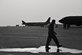 Brig. Gen. Darren E. Hartford 379th Air Expeditionary Wing commander, walks on the flight line after completing his fini flight in a KC-135 Stratotankers June 6, 2015. (U.S. Air Force photo/Staff Sgt. Alexandre Montes)