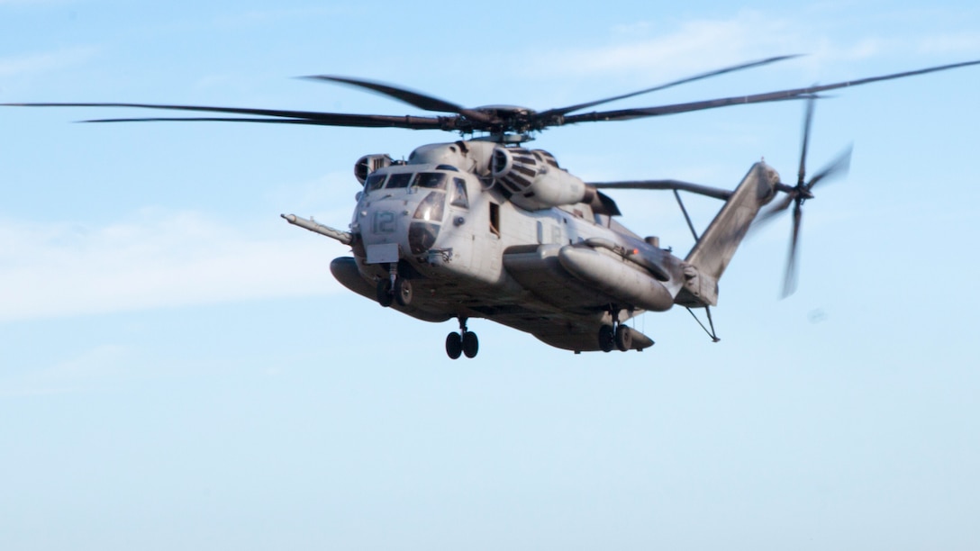 A U.S. Marines Corps CH-53E Super Stallion helicopter with Marine Heavy Helicopter Squadron 463, Marine Rotational Force – Darwin, flies over Darwin, Northern Territory, Australia, during a June 10 familiarization flight. The familiarization flight took off from RAAF Darwin, flew over the Port of Darwin and landed back at RAAF Darwin. MRF-D is an excellent opportunity to improve our knowledge of one another’s customs and traditions which ultimately strengthens U.S.-Australian military interoperability. 
