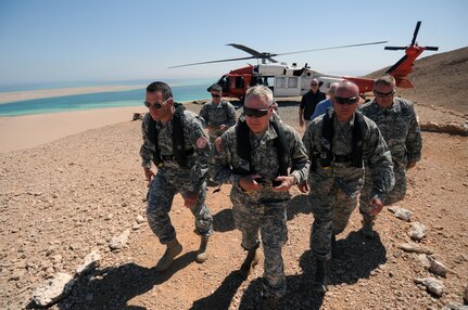 Army Gen. Frank Grass, chief, National Guard Bureau, and Air Force Chief Master Sgt. Mitchell Brush, his senior enlisted advisor, visit National Guard troops supporting the Multinational Force and Observers, Sinai, Egypt, June 1, 2015.