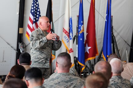 Air Force Chief Master Sgt. Mitchell Brush, senior enlisted advisor to the chief of the National Guard Bureau, talks with Air National Guard, active duty and reserve troops serving in Kuwait, June 5, 2015.