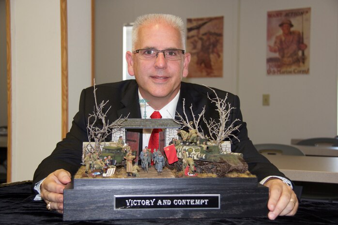 David Vickers won the AMPS master modeler award for his model "Victory and Contempt" that took him one year to build. Monday, June 8 at the Quantico Marine Corps Museum. David Vickers,AMPS master modeler, tells stories thorugh his models based on historical ideas.